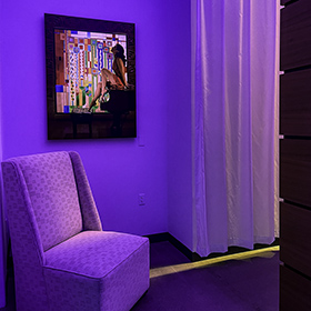 24" X 36" print of beautiful model on a piano at The Arizona Biltmore